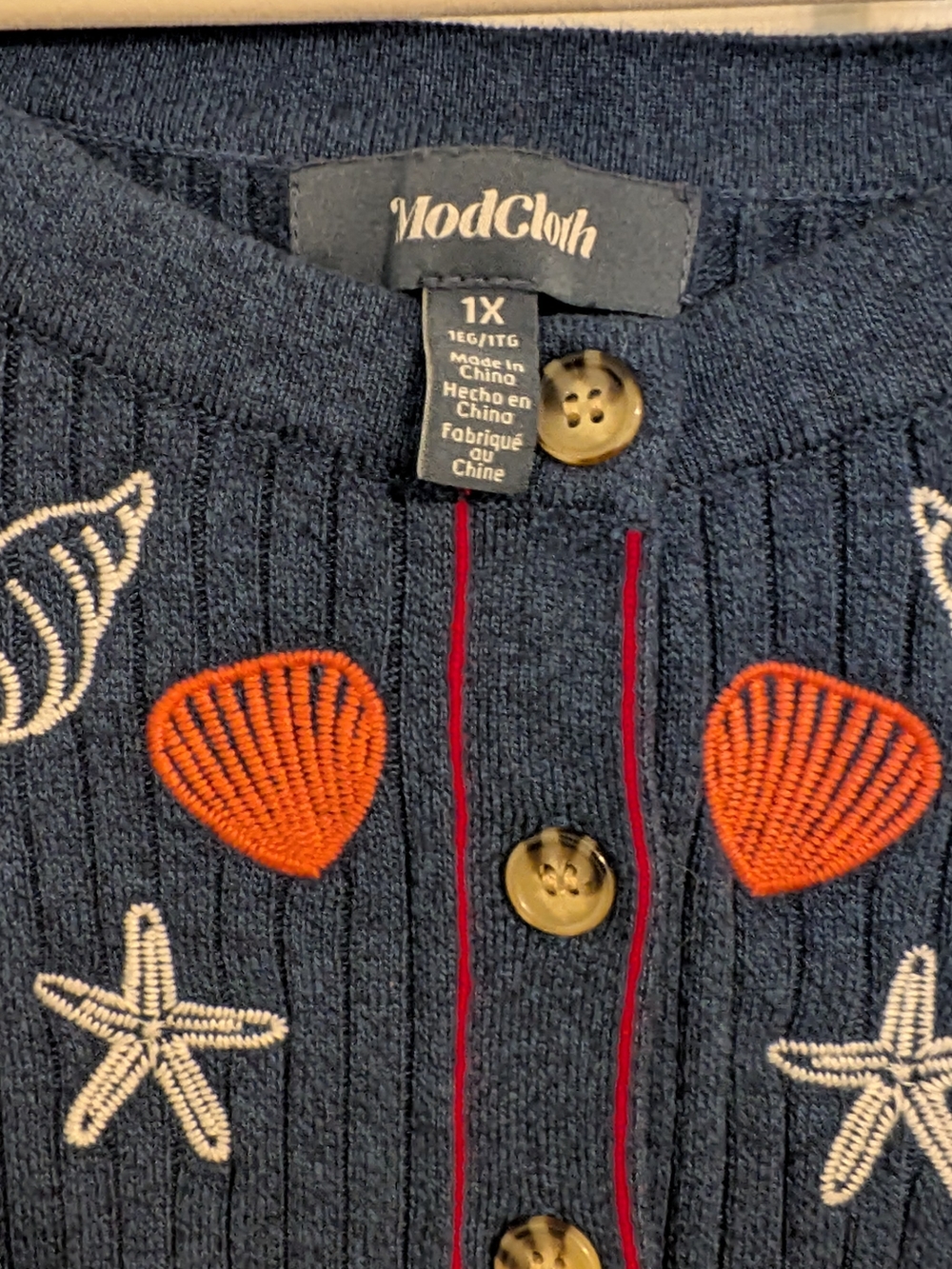 ModCloth Navy Short-Sleeve Knit Cardigan with Orange Shell Embroidery - Picture 2 of 5
